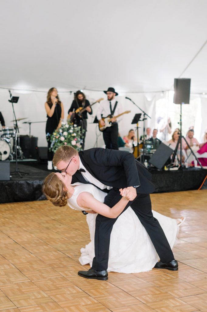 Bride and Groom dip kiss at Peterson Dumesnil House Wedding reception after first dance